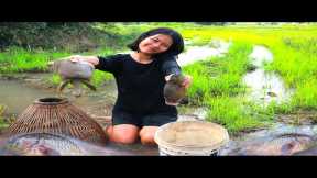 Girl catch fish with smart dogs