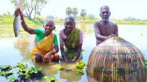 Santali old Grandfather & Grandmother catching fish from pond and cooking | tribal fishing & cooking