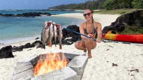 Hand spearing fish in murky water (catch, clean & cooking over primitive fire)
