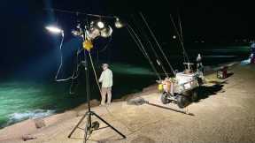 This mile long jetty was lit up with spotlights for hot fishing action